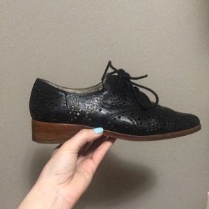 Black perforated loafers